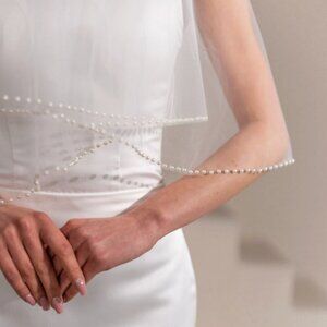 Double tier, two layer fingertip cathedral chapel veil with pearls